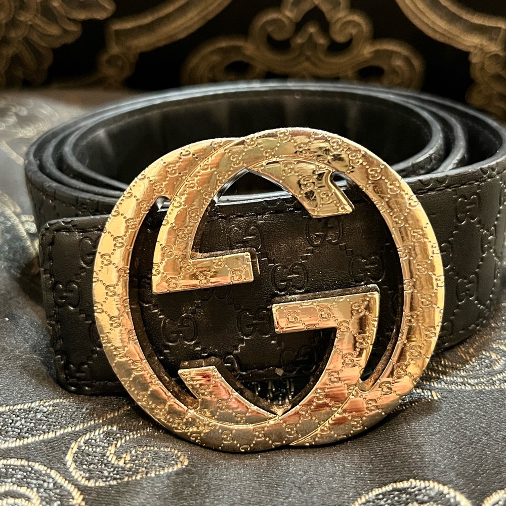 Gucci Embossed Black Belt with Gold Emblem